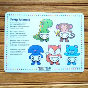 May include: A colorful chart with five animals wearing diapers. The chart is titled "Potty Animals" and includes instructions for using the chart as a potty training tool. The chart is part of a "Tiny Tot Reward Charts" set.