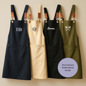 ポケット付きのパーソナライズされた刺繍入りエプロン。レストランや家庭料理用の刺繍入りキッチンウェア。