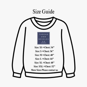 May include: A size guide for a sweatshirt with the text "Thread and Needles Co." and size measurements in inches. The sizes are XS, S, M, L, XL, and XXL. The guide states that for more sizes, please contact us.