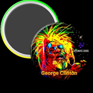 May include: A colorful button featuring a portrait of George Clinton with a bright yellow afro and sunglasses. The background is black with a few white stars and the text "ATOMIC DOG" in purple. The text "George Clinton" is in yellow at the bottom of the button.