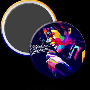 May include: A colorful pop art style illustration of Michael Jackson singing into a microphone. The background is dark blue with the text "Michael Jackson" in white cursive.