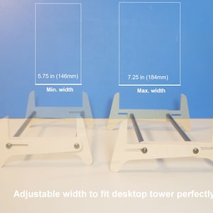 May include: Two wooden desktop tower stands with adjustable width. The minimum width is 5.75 inches (146mm), and the maximum width is 7.25 inches (184mm). The stands are white with metal support bars. Text: Adjustable width to fit desktop tower perfectly.