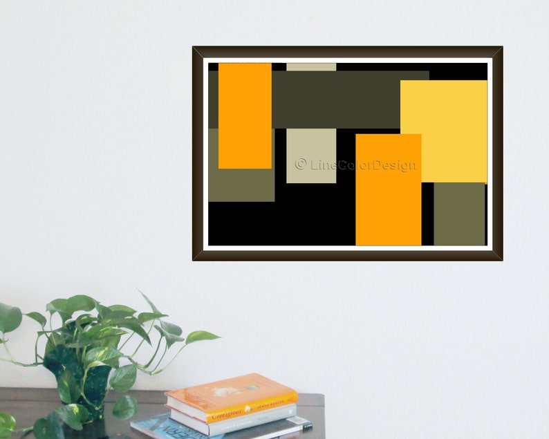 May include: Abstract art print featuring a geometric design with rectangular shapes in shades of orange, yellow, olive green, and black. The artwork is framed in a dark brown frame and includes the text "Line Color Design".