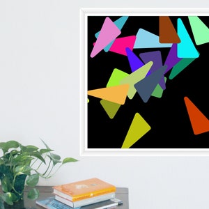 May include: Abstract art print with a black backdrop, showcasing a collection of colourful triangles. The triangles are in shades of pink, blue, green, orange, and yellow. The artwork is framed in a white square frame.