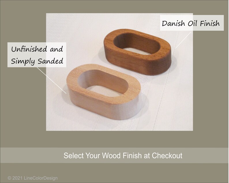 May include: Two wooden oval-shaped objects, one unfinished and sanded, the other with a Danish oil finish. The unfinished piece is light-colored, while the finished piece is a rich brown. Text reads "Unfinished and Simply Sanded" and "Danish Oil Finish".