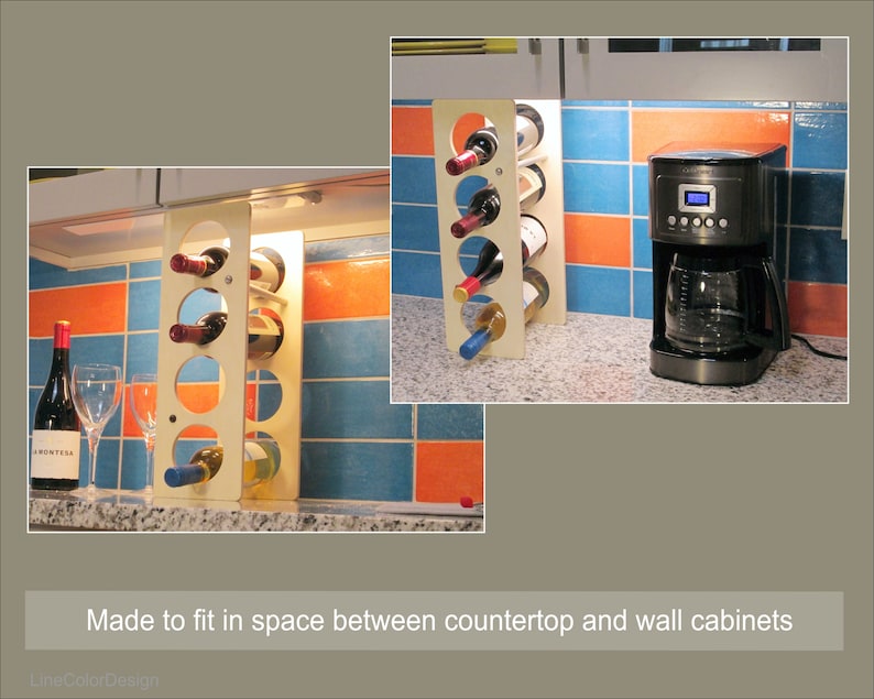 May include: A wooden wine rack with circular openings, holding several bottles of wine. The rack is light-colored and stands on a countertop next to a coffee maker. The background features blue and orange tiled walls. The text says "Made to fit in space between countertop and wall cabinets."