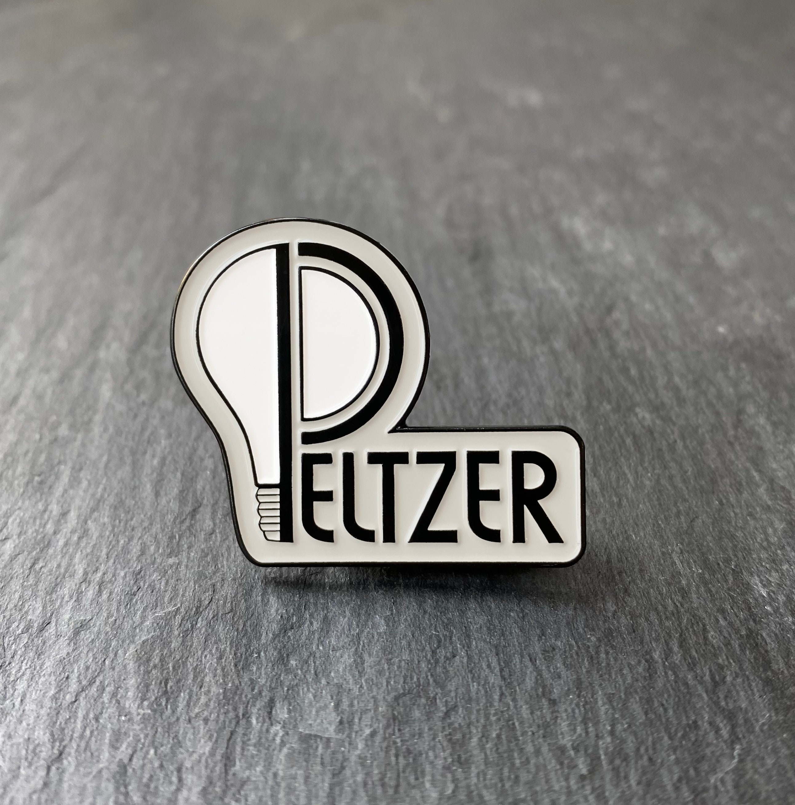 Peltzer soft enamel pin badge
