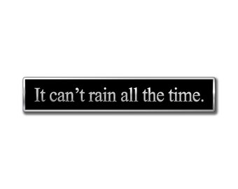 Verbatim "It can't rain all the time," hard enamel quotation pin badge