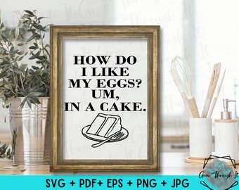 May include: A printable design for a sign that says "How do I like my eggs? Um, in a cake." The sign is framed in a gold frame and is sitting on a table with a white background.