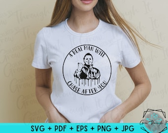 May include: A white t-shirt with a black and white graphic of a horror movie character holding a knife. The graphic is in a circle with the text "A real man will chase after you".