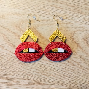 Gold tooth leather lip earrings