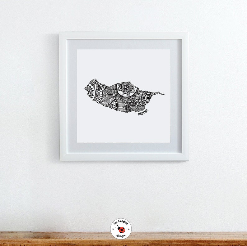 May include: A black and white line art print of the island of Madeira, Portugal. The island is filled with intricate patterns and designs. The word "Madeira" is written in black at the bottom of the print.