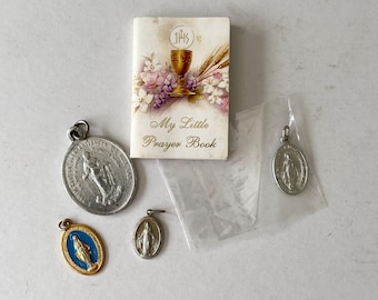 4 Miraculous Medals and 1 Small Prayer Book