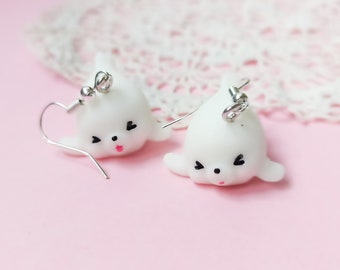 “Baby seal” earrings