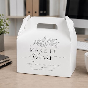 May include: A white cardboard gable box featuring a black botanical illustration of leaves and the text "MAKE IT Yours" followed by "YOUR LOGO OR CUSTOM DESIGN" and "PRINTED FOR YOUR BRAND" with a small heart icon centred below the text.