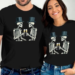 Halloween skeleton funny skeletons toasting t-shirt,  spooky skeletons toast tee,  skeleton costume party shirt, holiday skeleton top.