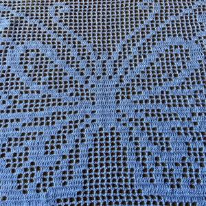 Tapete de mariposa hecho a mano de ganchillo