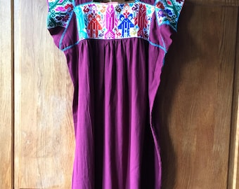 Mexican embroidered dress, Nahua Puebla region, Mexican embroidered dress, traditional Mexican textiles, Mexican fashion, Mexican outfit.