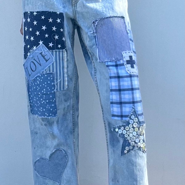 Patched and distressed jeans, festival jeans, vintage patches, upcycled jeans, boho cross patch hippie fashion , free people inspire