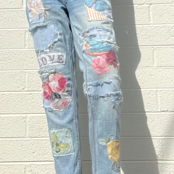 Patched jeans with denim patches, birds, butterflies and flowers, upcycled AE festival jeans ripped hippie jeans, repurposed denim, ooak