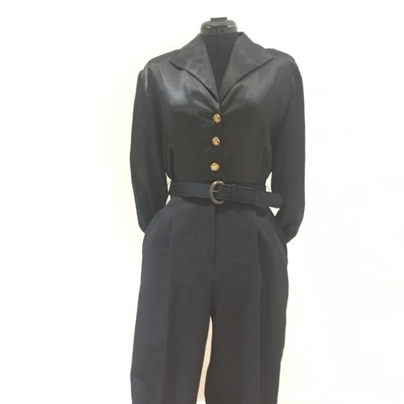 Vintage black 1980s jumpsuit.