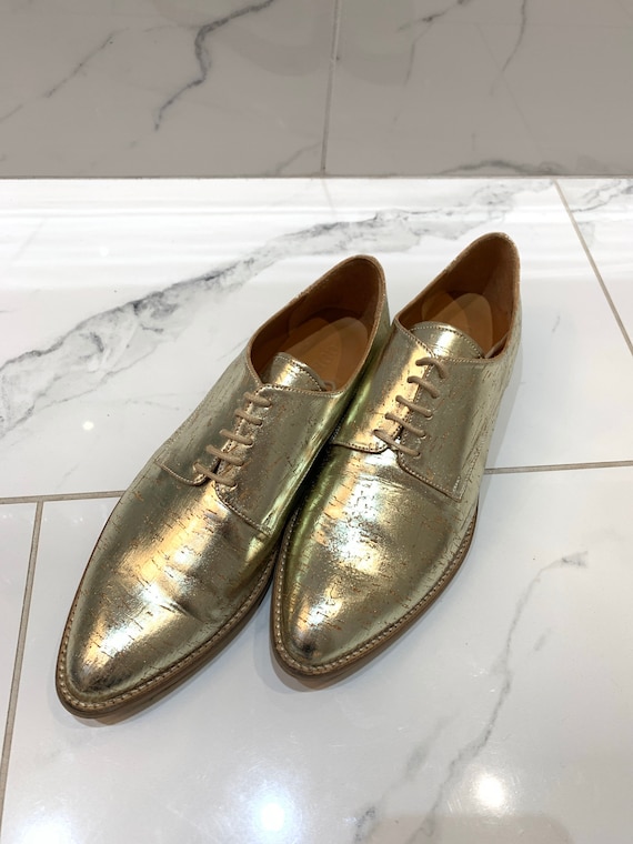 Leather gold shoes