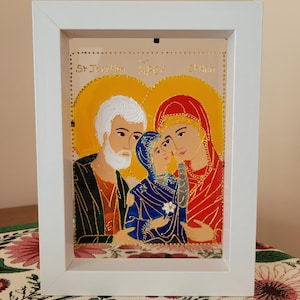 St Ann, St Joachim and Mary Icon with white frame/ icon de Ste Anne, St Joachim et Marie: handpainted glass with fram