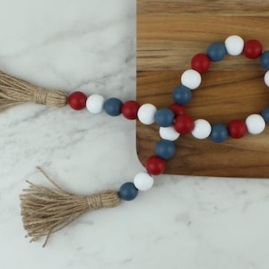 Handcrafted Red, White & Blue Beaded Wood Garland for 4th of July Tiered Tray Home Decor Displays