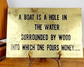 Vintage Brass Plaque or Sign & Natical Brass Stand. "A Boat is a Hole in the Water Surrounded By Wood Into Which One Pours Money". Funny!