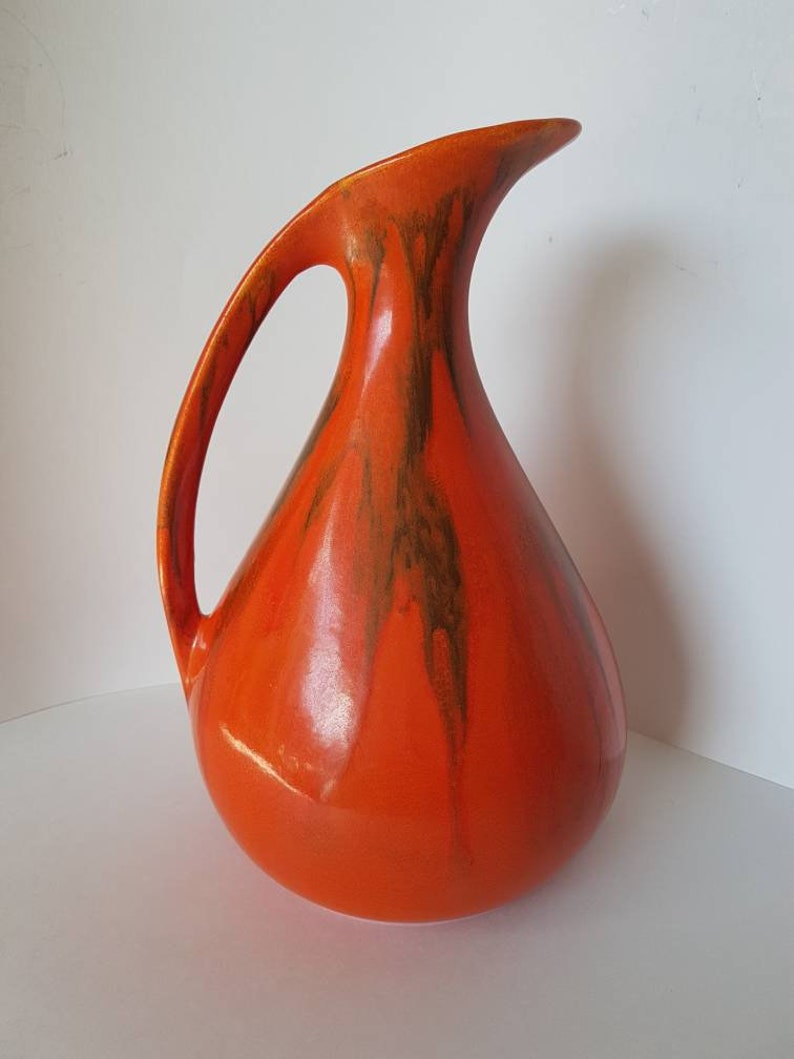 Vintage Mid-century Modern Design bright orange flambe drip glazed Ewer or Jug Royal Haeger Atomic Chrome Red Orange West Germany USA