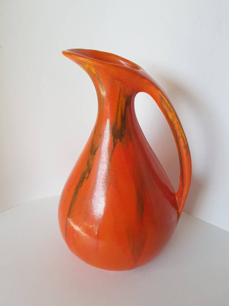 Vintage Mid-century Modern Design bright orange flambe drip glazed Ewer or Jug Royal Haeger Atomic Chrome Red Orange West Germany USA