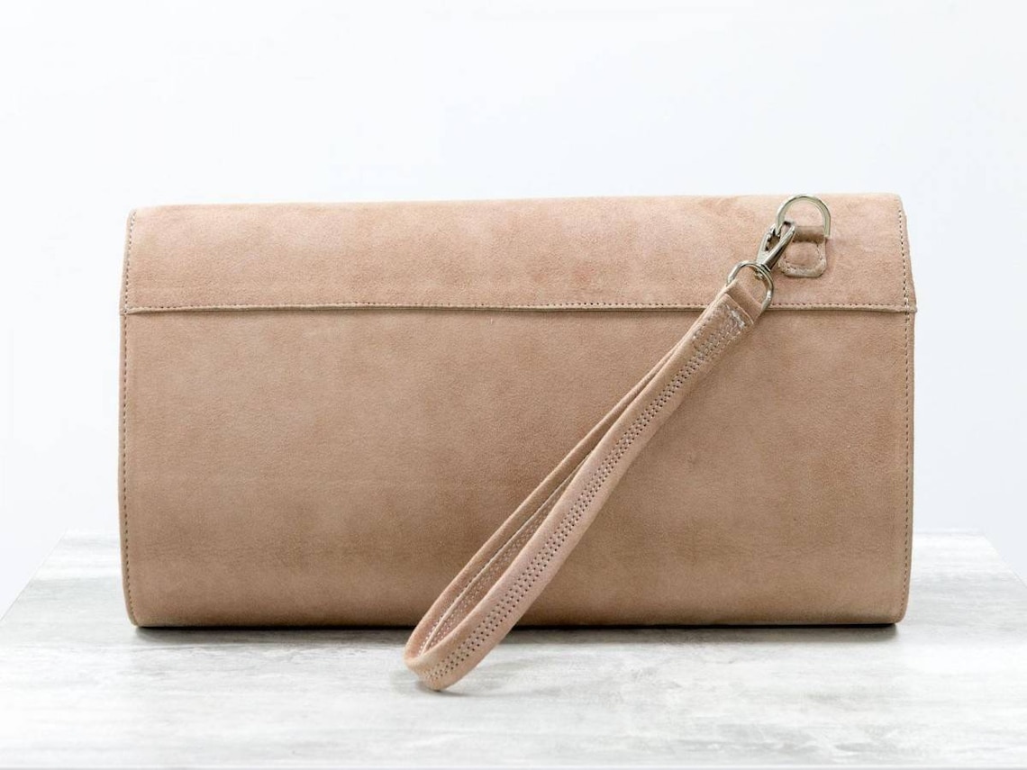Women's beige suede clutch bag with handle Etsy