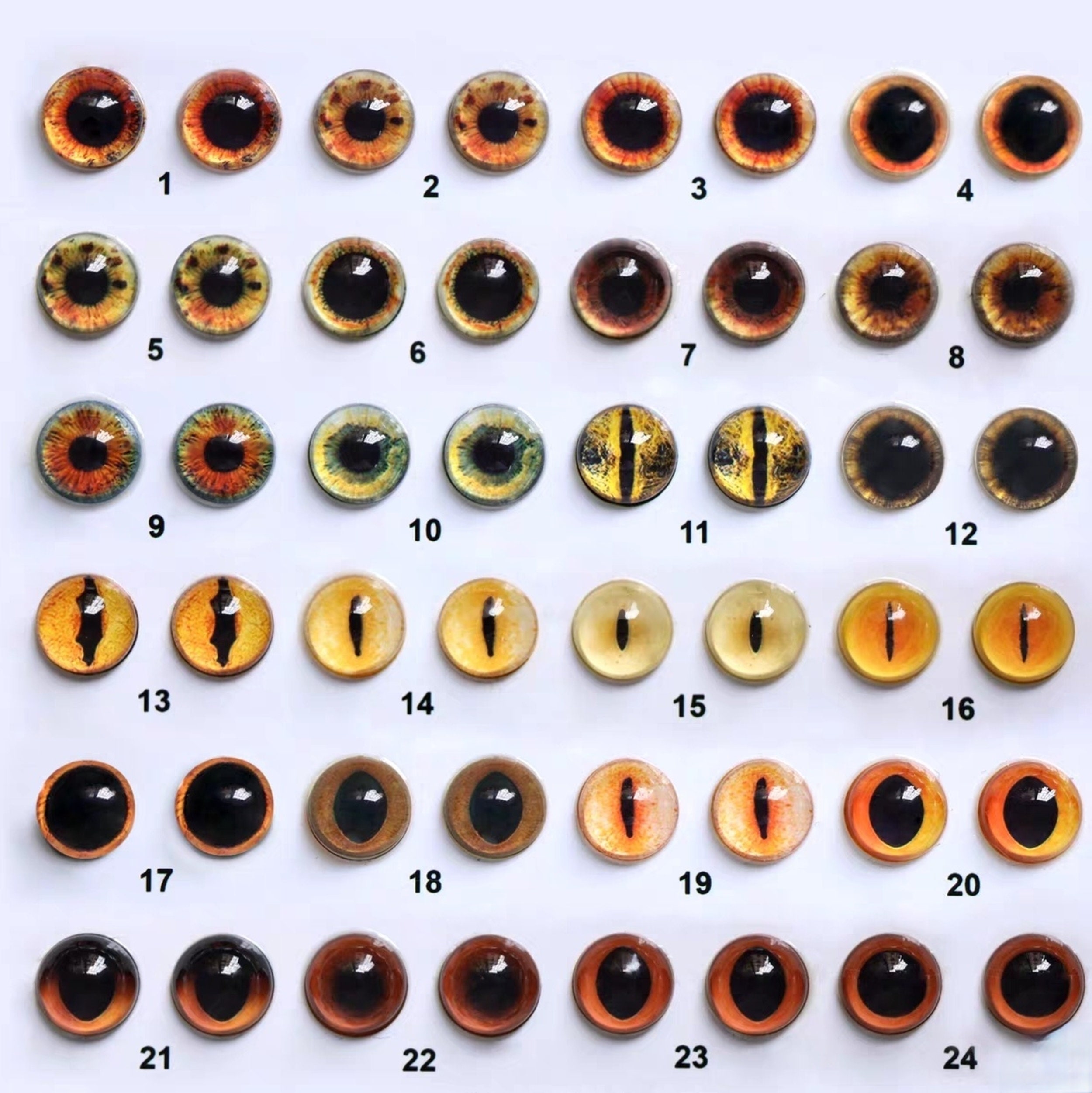 30mm Clear Safety Eyes with an Orange Glitter Slip and Black Iris