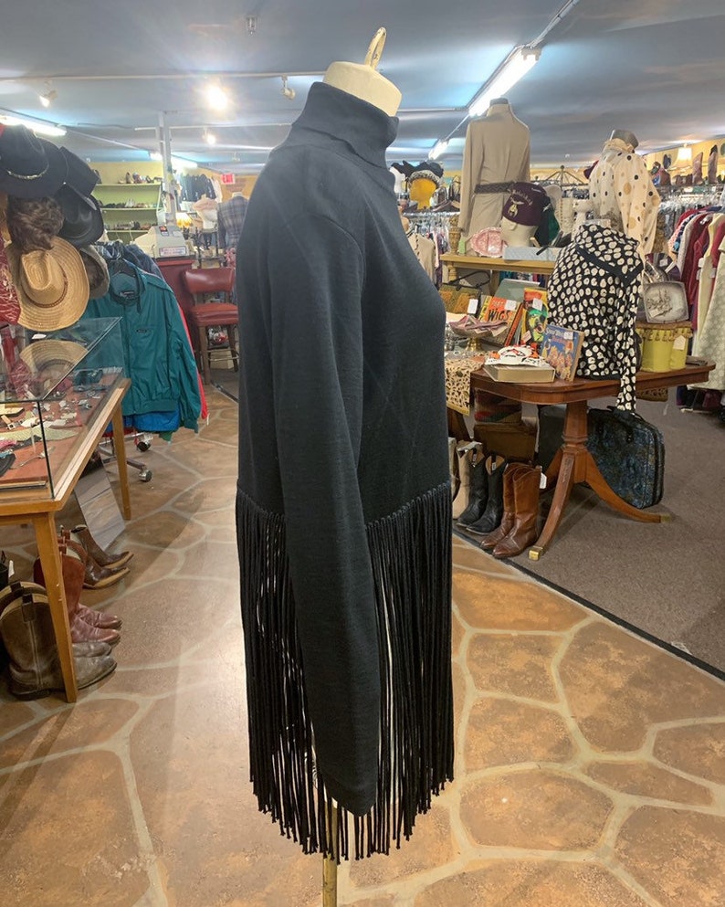 1980s 1990s Andrea Jovine black wool turtleneck sweater with long fringe Vintage 80s wool fringe sweater