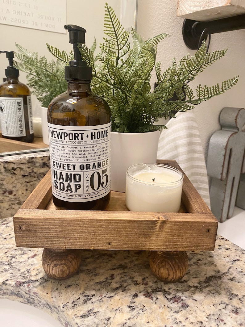 How To Decorate A Bathroom Vanity Tray With Accessories