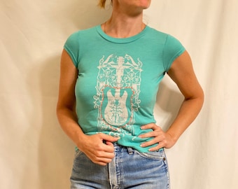 Turquoise Baby Tee w/ ‘HURLEY’ Guitar Graphic, Girls’ Sized or Women’s XS