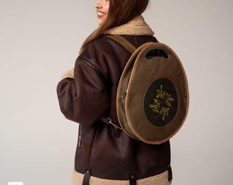 Elegant Green Leather Handbag with Backpack Function, Handmade Convertible Bag, Unique Embroidered Design