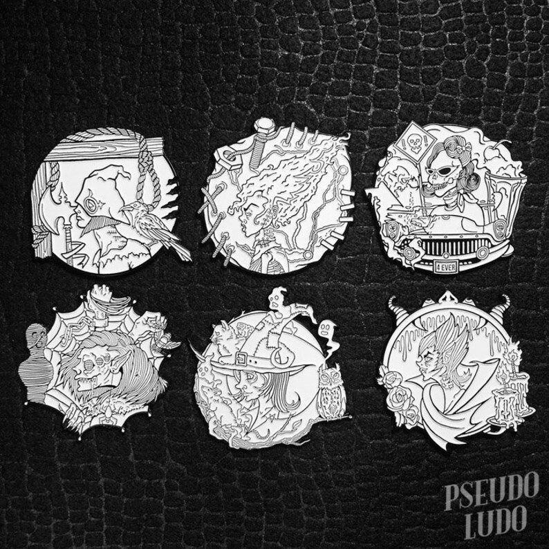 May include: Set of six black and white enamel pins featuring various spooky Halloween characters and designs. The pins include a witch, a ghost, a skeleton, a vampire, a werewolf, and a zombie. Each pin is approximately 1 inch in diameter.