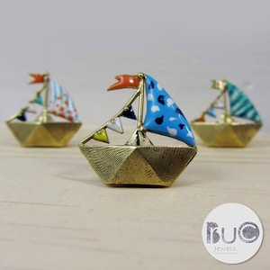 Boat origami pins