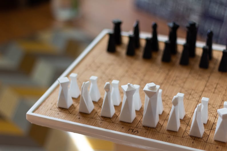 Modern geometric handmade resin chess pieces, elegantly weighted for balance and style. Unique designs perfect for board games, home decor, or a luxury personalized gift. Chessboard not included. Sleek, minimalist aesthetic ideal for any interior.