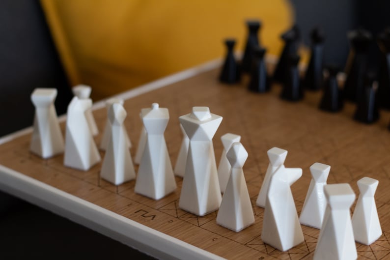 Modern geometric handmade resin chess pieces, elegantly weighted for balance and style. Unique designs perfect for board games, home decor, or a luxury personalized gift. Chessboard not included. Sleek, minimalist aesthetic ideal for any interior.
