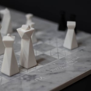 Modern geometric handmade resin chess pieces, elegantly weighted for balance and style. Unique designs perfect for board games, home decor, or a luxury personalized gift. Chessboard not included. Sleek, minimalist aesthetic ideal for any interior.