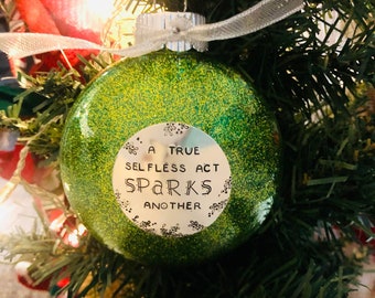 A True Selfless Act Sparks Another Glitter Ornament