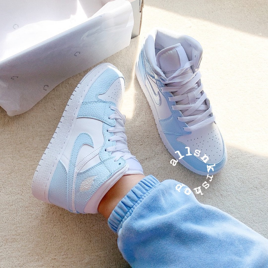 white and baby blue jordans