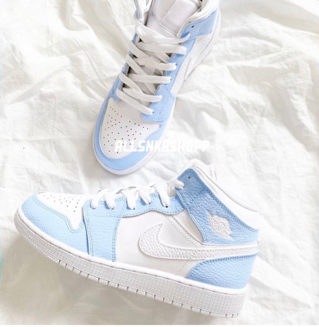 baby blue and white jordan ones