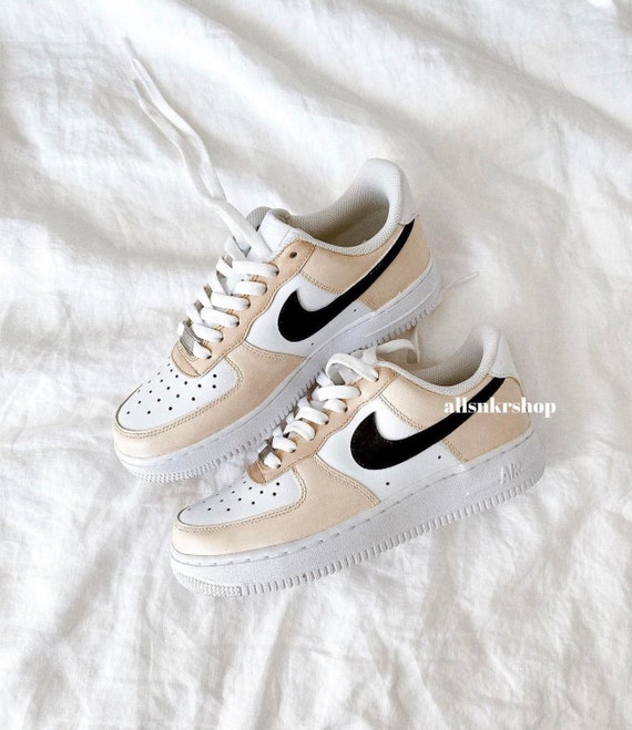 women's nike air force 1 with black swoosh