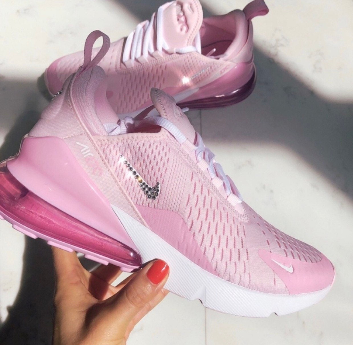 white and pink nike air 270