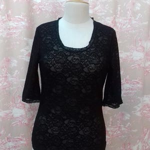 Black stretch lace fitted bispoke t-shirt with above elbow sleeves.