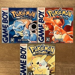 May include: Three Pokémon Game Boy game cartridges: Blue Version, Red Version, and Yellow Version. The Blue Version features a blue turtle-like creature. The Red Version features a red dragon-like creature. The Yellow Version features Pikachu.