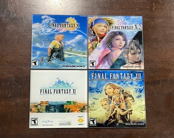 May include: Four Final Fantasy video game cases are displayed. The cases are for Final Fantasy X, X-2, XI, and XII. Each case features character artwork and the game title. The cases are in good condition and are displayed on a wooden surface.